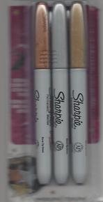 Silver, gold, and bronze metallic markers